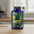 A bottle of eyetamins by OPTFASE OmegaEye Advanced with fish oil dietary supplement, placed on a light wooden table with coffee beans in the foreground and a blurred kitchen background.