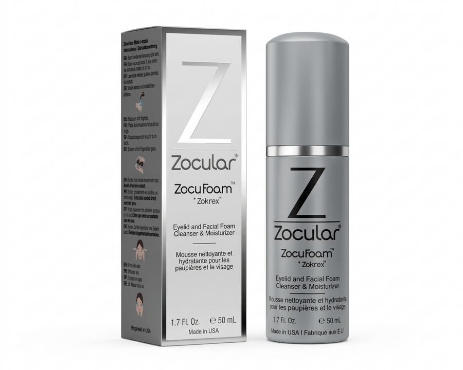 Zocular ZocuFoam 29crisel Eyelid and Facial Cleanser & Moisturizer shown in its silver bottle and matching gray-and-white retail box on a white background.