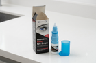 Eyedrop packaging and bottle on a white countertop. The box reads 'Intensive Relief Eye Drops' and shows an eye graphic, next to a small blue dropper bottle and its blue cap.