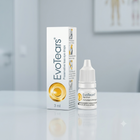 EvoTears preservative-free eye drops shown with its white and gold retail box and a small white dropper bottle on a clean light gray surface.