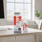 Hydro Forte preservative-free lubricating drops and its retail box displayed on a light wood desk in a bright, modern office setting.