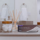 Dailies Total 1 Multifocal box on a bathroom counter